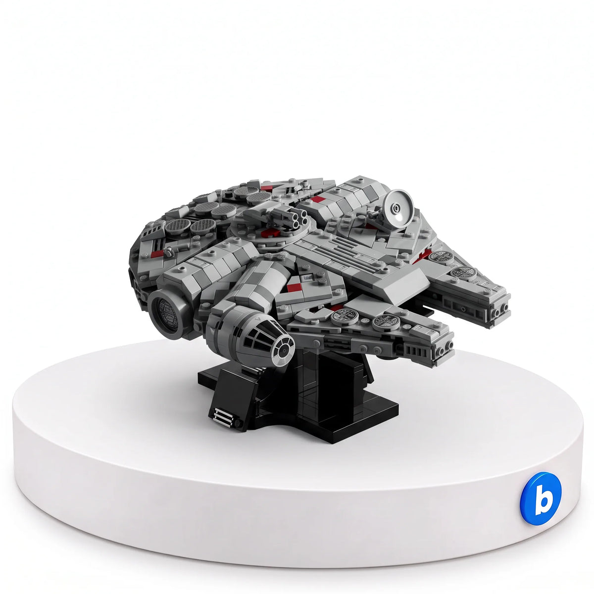 Nave Millenium Falcon - Star Wars em blocos de montar BlocoBox, com 921 peças, na base branca com o selo da BlocoBox